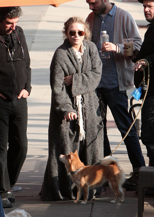 Mary Kate Olsen dresses in what looks like a blanket