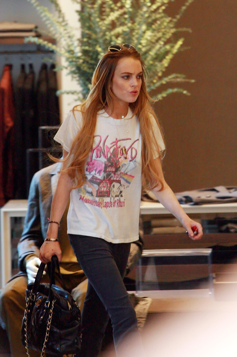 Lindsay Lohan goes shopping and denies breaking up with Samantha