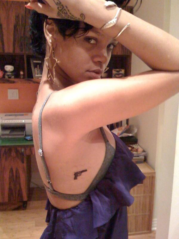 Cele|bitchy » Blog Archive » Rihanna gets a tiny gun tattoo