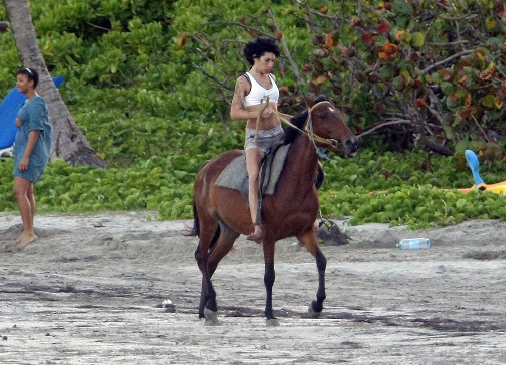 fp_2070343_amy_winehouse_rides_horses_in_st__lucia_at_sunset_
