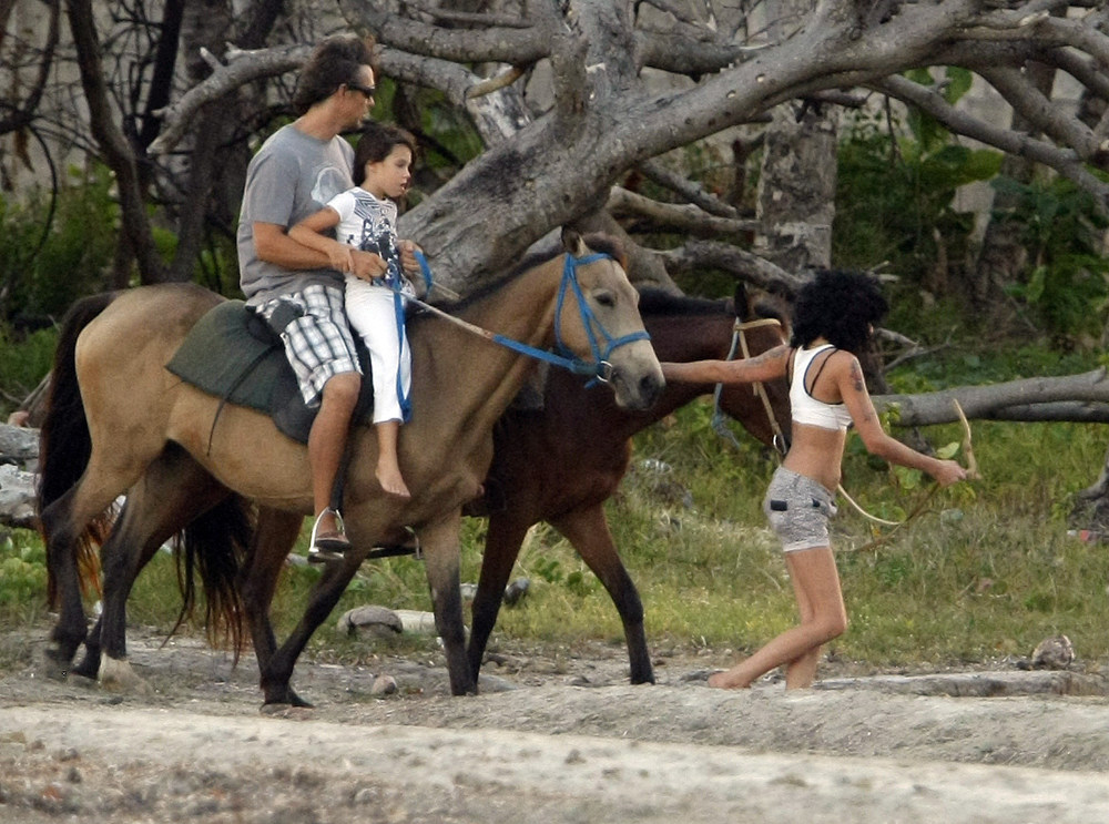 fp_2070371_amy_winehouse_rides_horses_in_st__lucia_at_sunset_