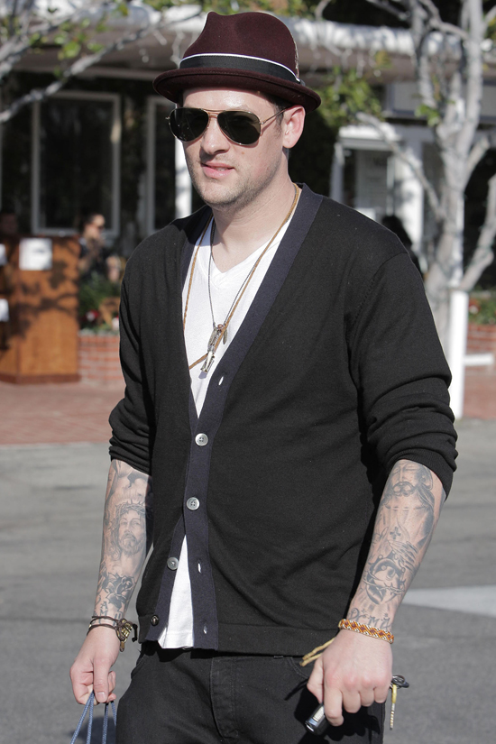  not let Joel Madden board a flight until he covered his tattooed arms