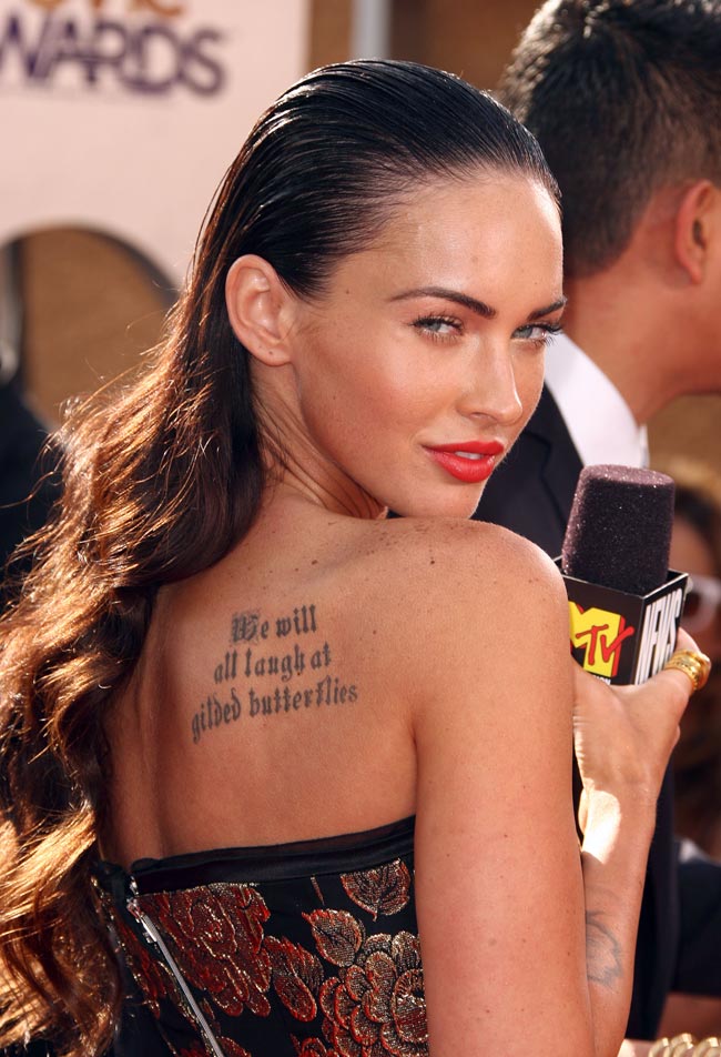 megan fox tattoos what do they say. Megan Fox has eight tattoos in