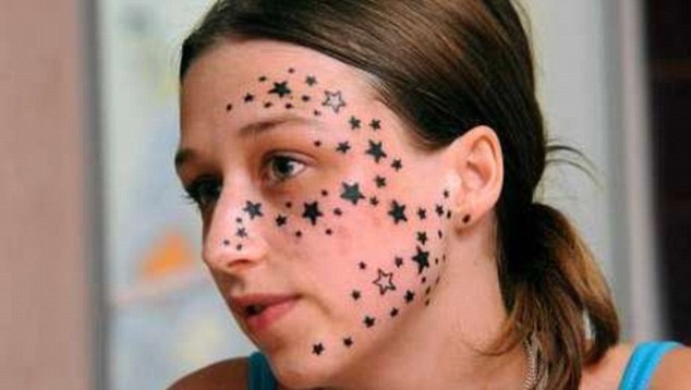 This girl asked for three stars tattooed on her face and came back with 56