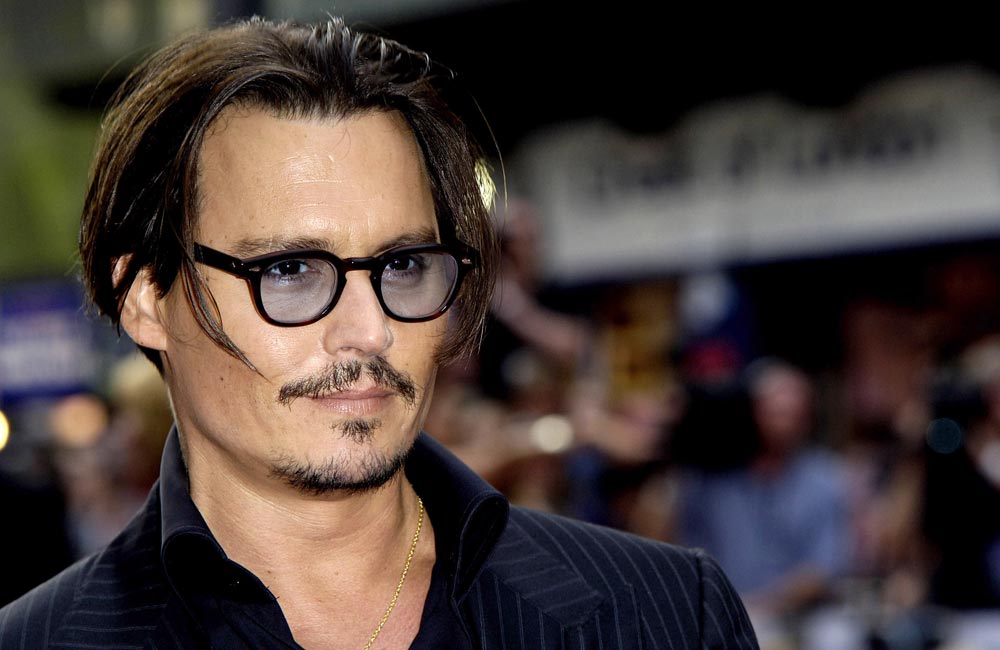 Johnny Depp says he quit smoking 2 and a half years ago. wenn2481479