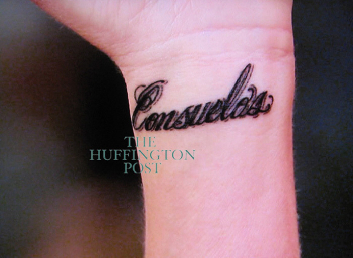 It's a really ugly cursive tattoo of Consuelos her married name