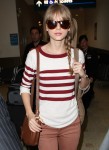 FFN_BIGOZ_SwiftTaylor_Airport_022812_8823596