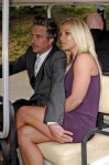 Britney Spears and fiance Jason Trawick ride a golf cart through Central Park on their way to the Fox Upfronts in New York City