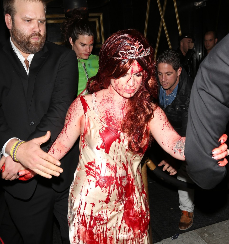 Kelly Osbourne leaves Bootsy Bellows Halloween party dressed in a blood-stained Carrie costume in West Hollywood