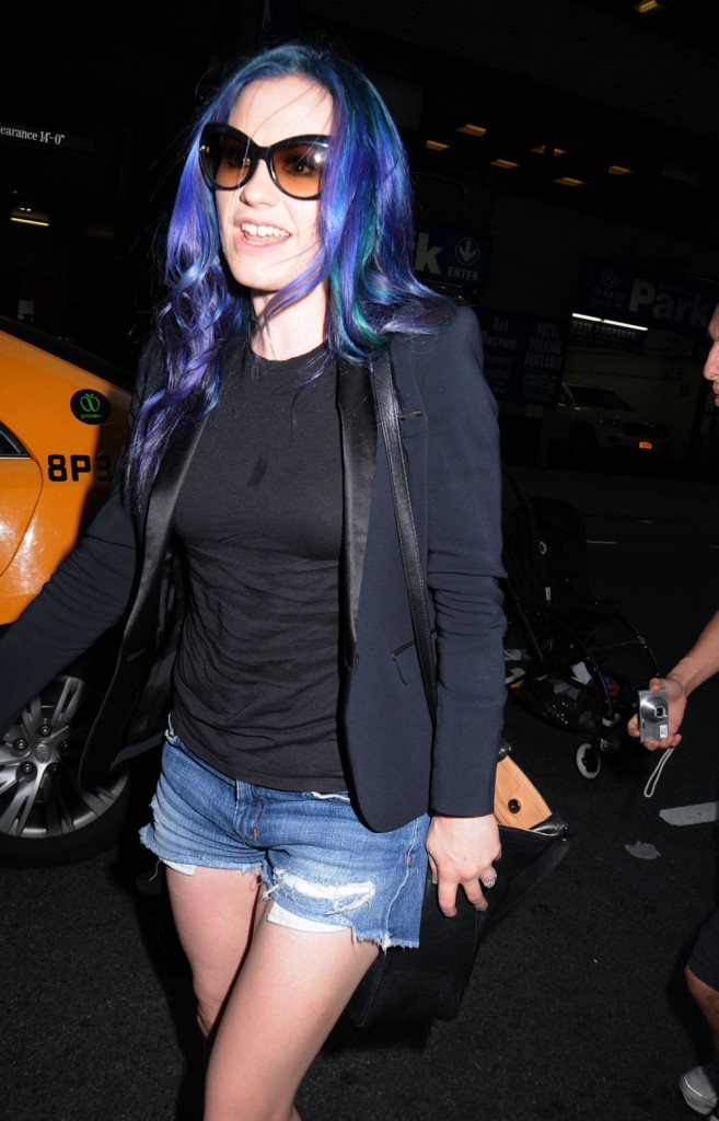 TRUE COLORS! Anna Paquin shows off her newly dyed purple and blue hair as she arrives at her hotel in NYC