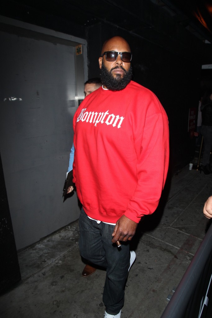 Suge Knight wheres a Compton sweatshirt as he heads into 1Oak Nightclub in Los Angeles