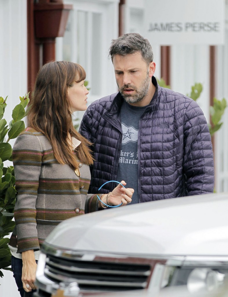 Jennifer Garner and Ben Affleck seen having what appears to be a serious conversation while out shopping and having lunch with their daughters in LA