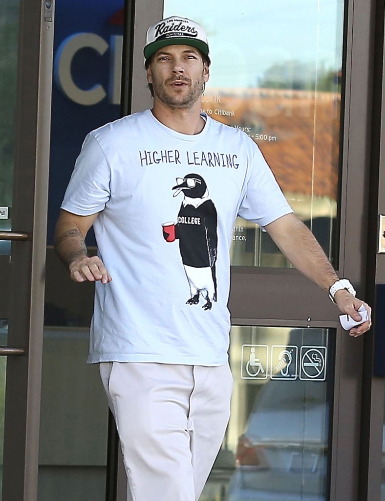 Kevin Federline Leaving A Bank In Calabasas