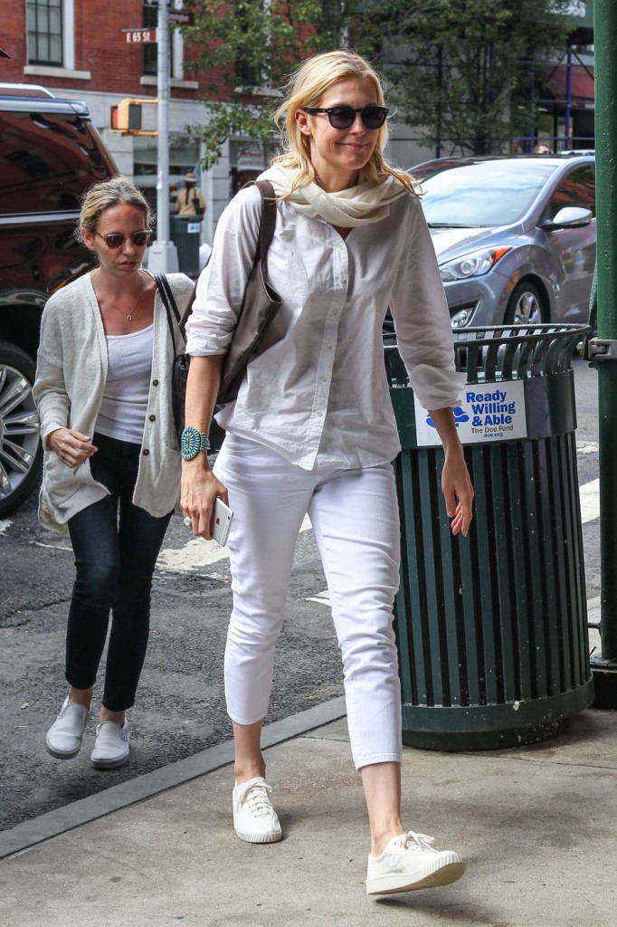 Kelly Rutherford manages a small smile as she steps out for lunch after leaving court, where she was ordered to send her children to their father in Monaco