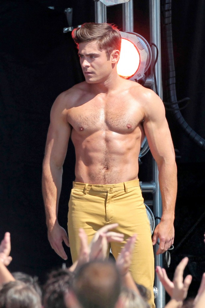 Zac Efron and Robert De Niro show off slightly different physiques as they both go shirtless while filming a scene for 'Dirty Grandpa'