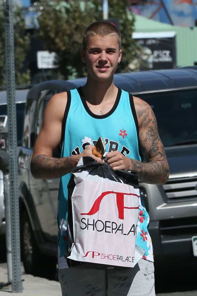 Justin Bieber buying shoes on Melrose