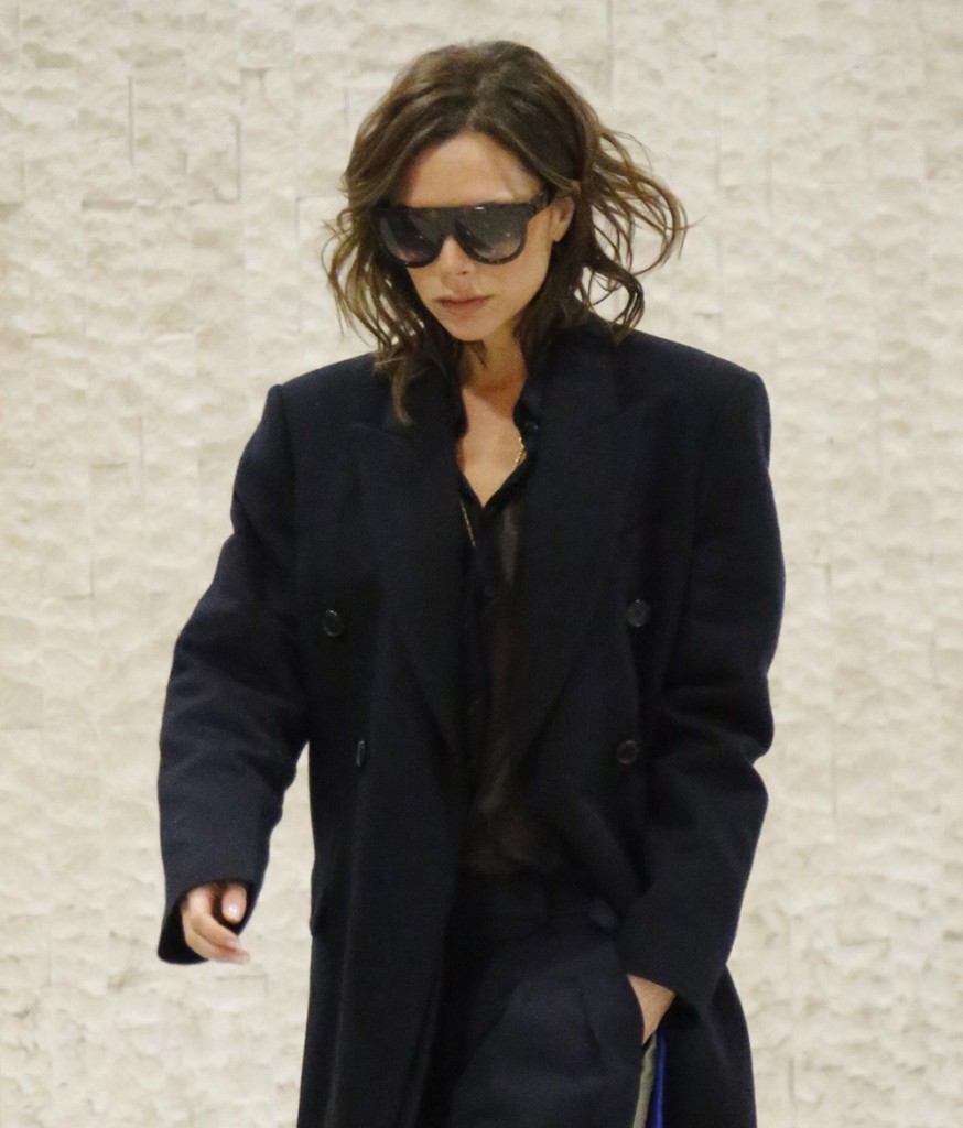 Victoria Beckham Looks Chic At JFK Airport