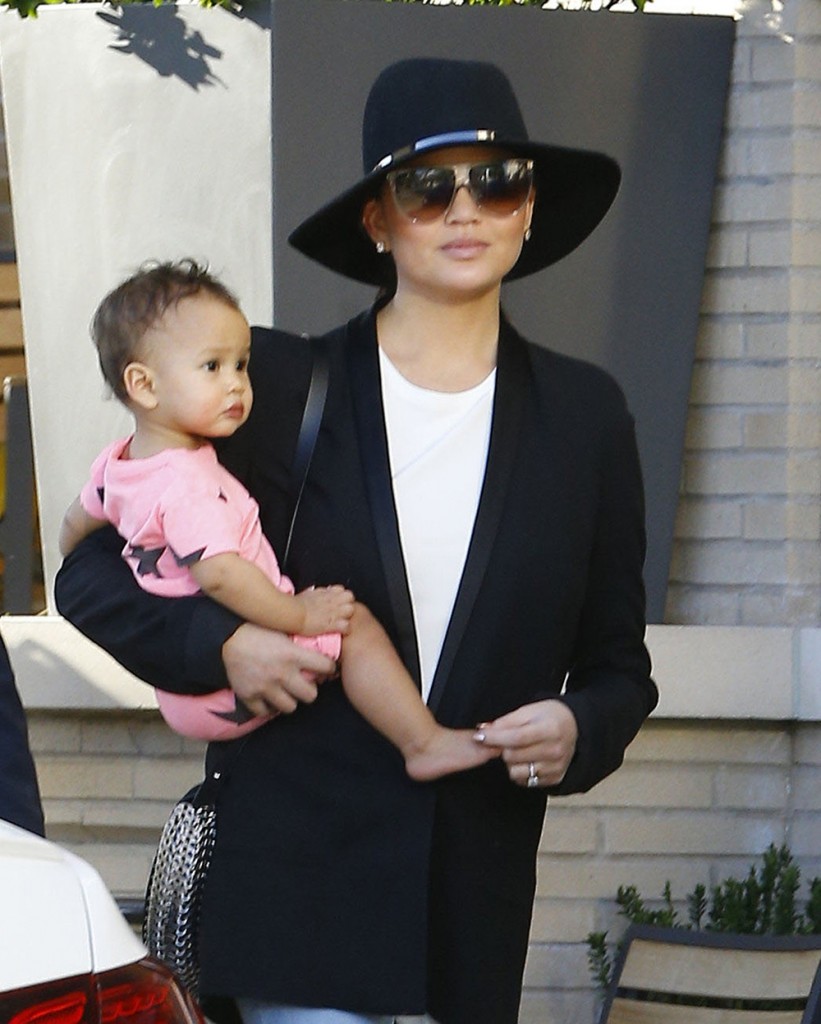 Chrissy Teigen & John Legend Shopping At Barneys New York