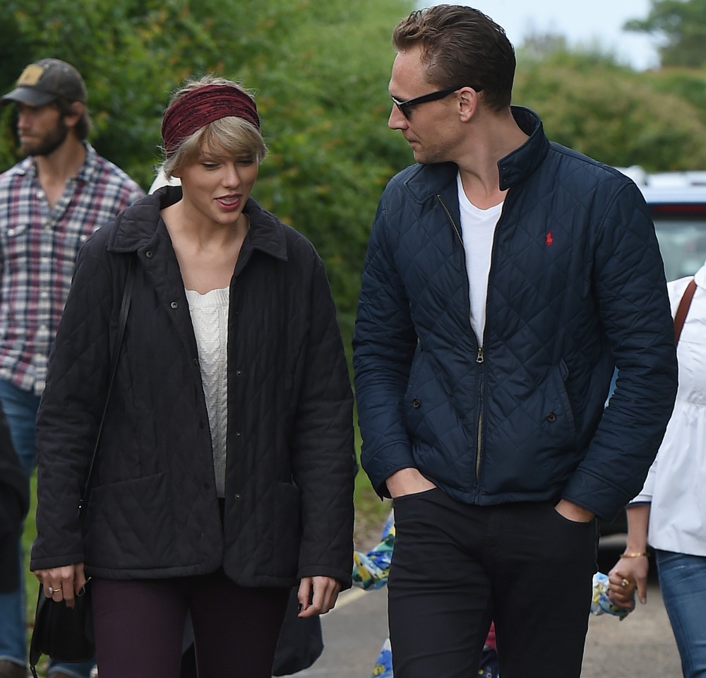 Taylor Swift and new boyfriend Tom Hiddleston enjoy a romantic walk on the beach near Lowestoft in Suffolk