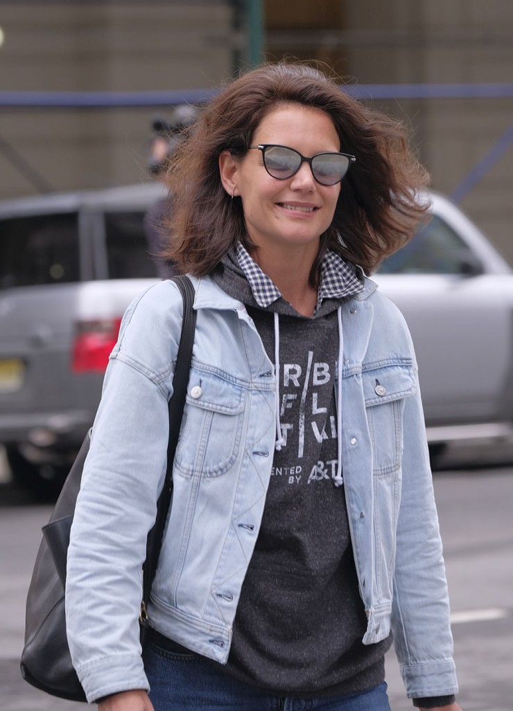 Katie Holmes greets fans while walking in TriBeCa