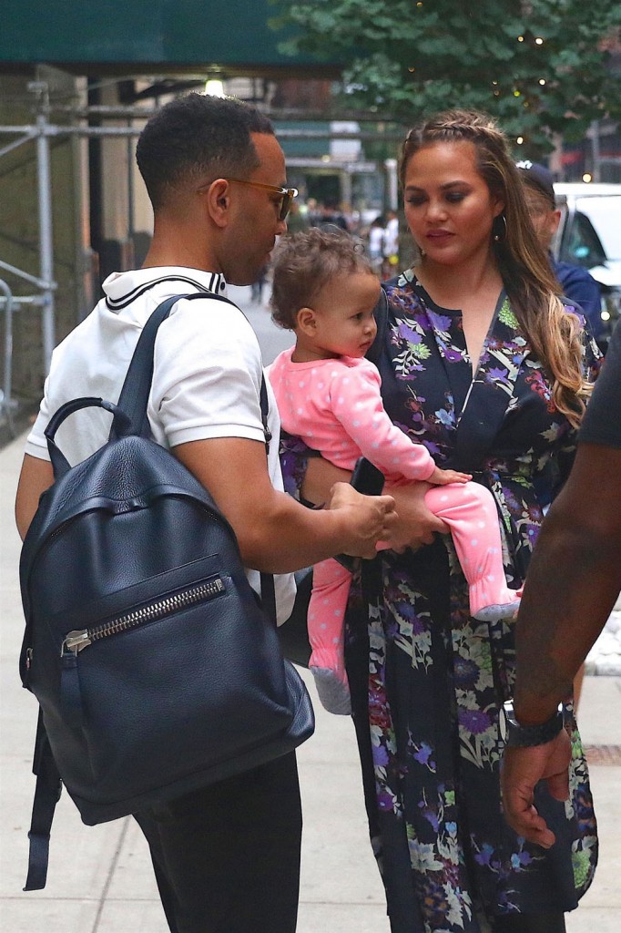 Chrissy Teigen & John Legend check out of their hotel in New York