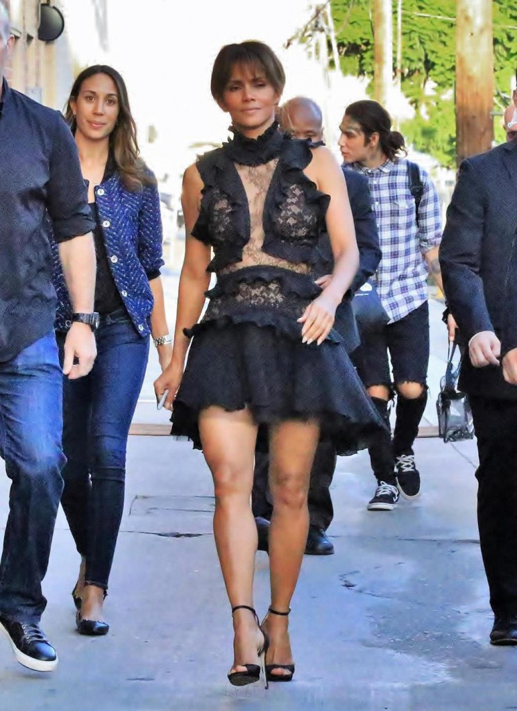 Halle Berry signs autographs for waiting fans as she arrives for her appearance on Jimmy Kimmel Live!