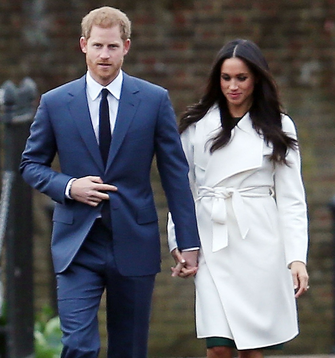 Prince Harry and fiancee Meghan Markle arriving at Kensington Palace to announce their engagement