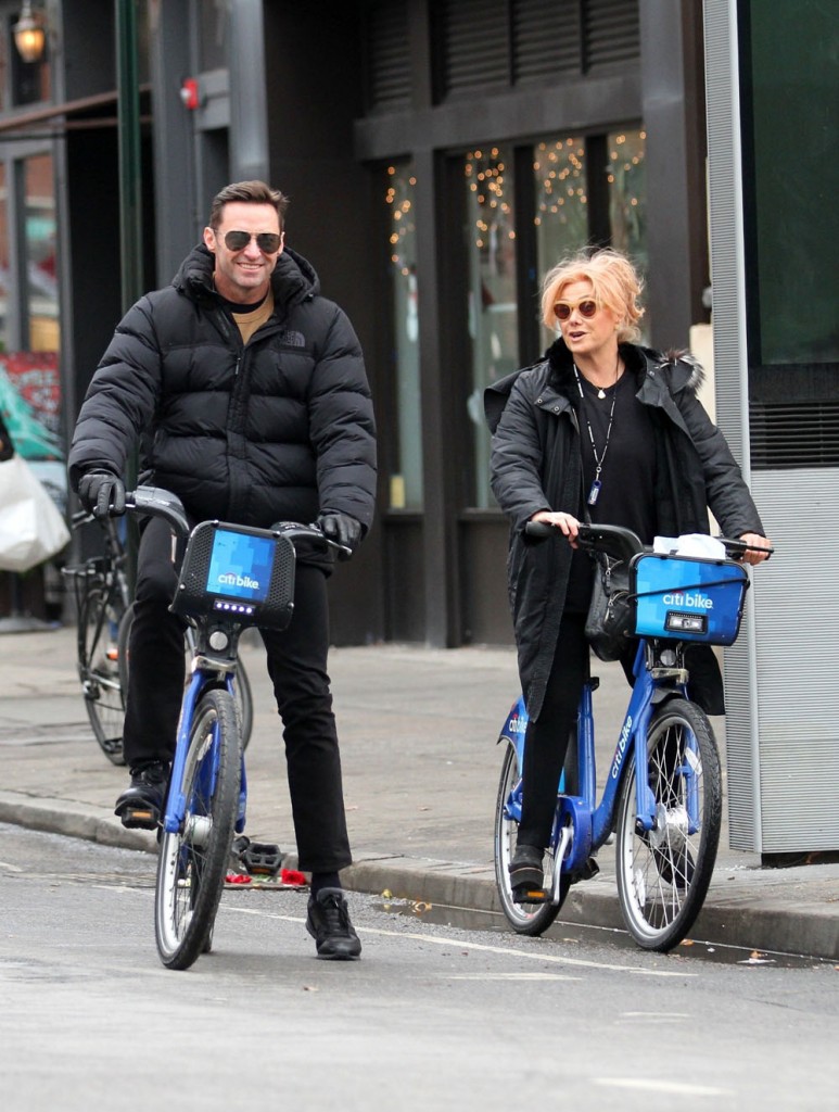 Hugh Jackman is all smiles while out riding on Citibikes with Wife Deborra-lee Furness