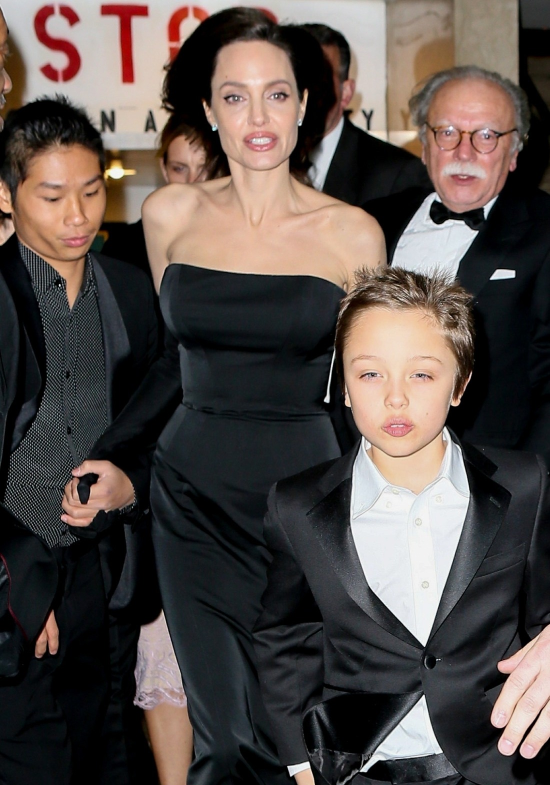Sexy and single Angelina Jolie leaves Cipriani's Wall Street with her well dressed kids