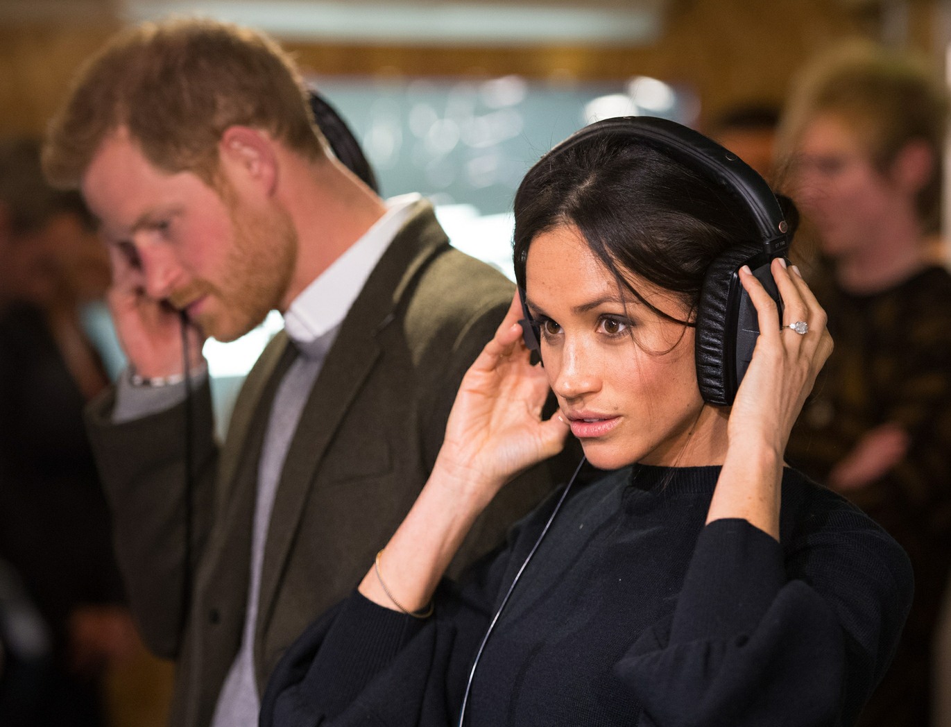 Meghan Markle and Prince Harry during a visit to youth-orientated radio station, Reprezent FM, in Brixton, south London to learn about its work supporting young people