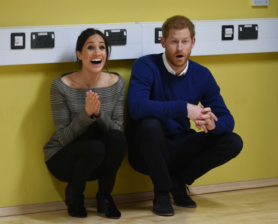 Prince Harry and Meghan Markle meet a street dance class during their visit to Star Hub, a community and leisure centre in the Tremorfa area of Cardiff