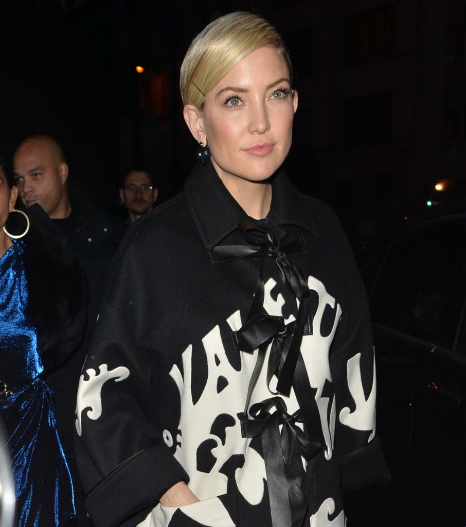 Kate Hudson goes out in Paris weaing a Valentino coat, polka dot tights and black platform heels