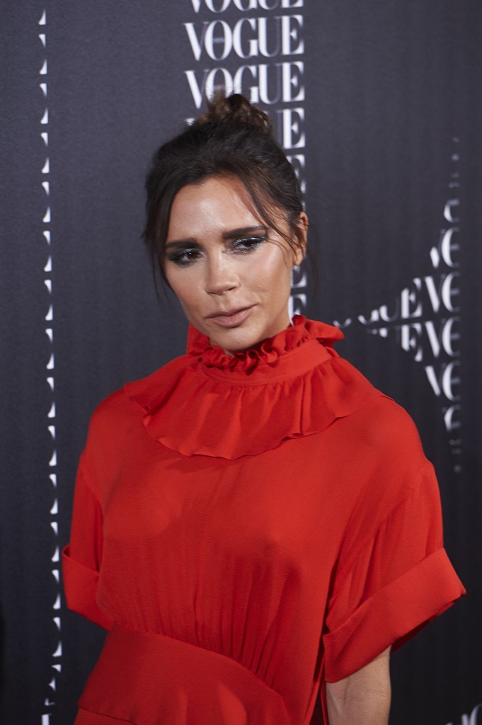 Victoria Beckham arrives at a Vogue dinner in her honor