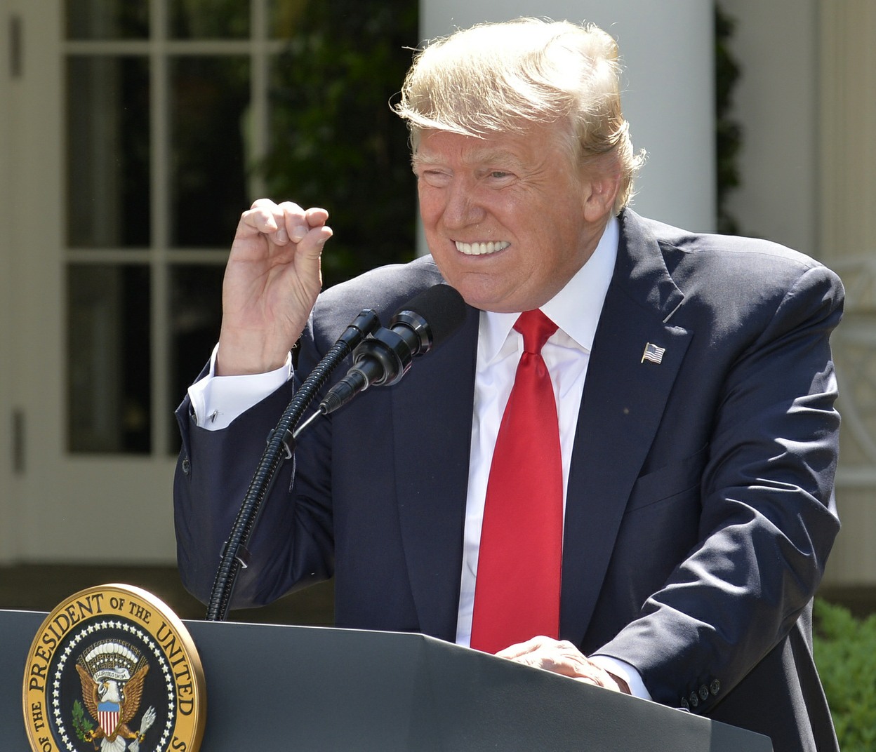 U.S. President Donald Trump gestures as he explains his decision to pull the United States out of the Paris Climate Agreement at the White House