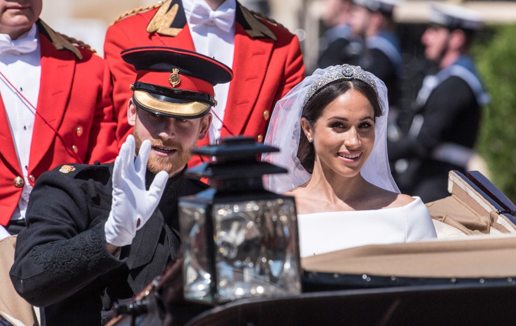 Meghan Markle and Prince Harry ride in an Ascot Landau carriage through Windsor after their wedding