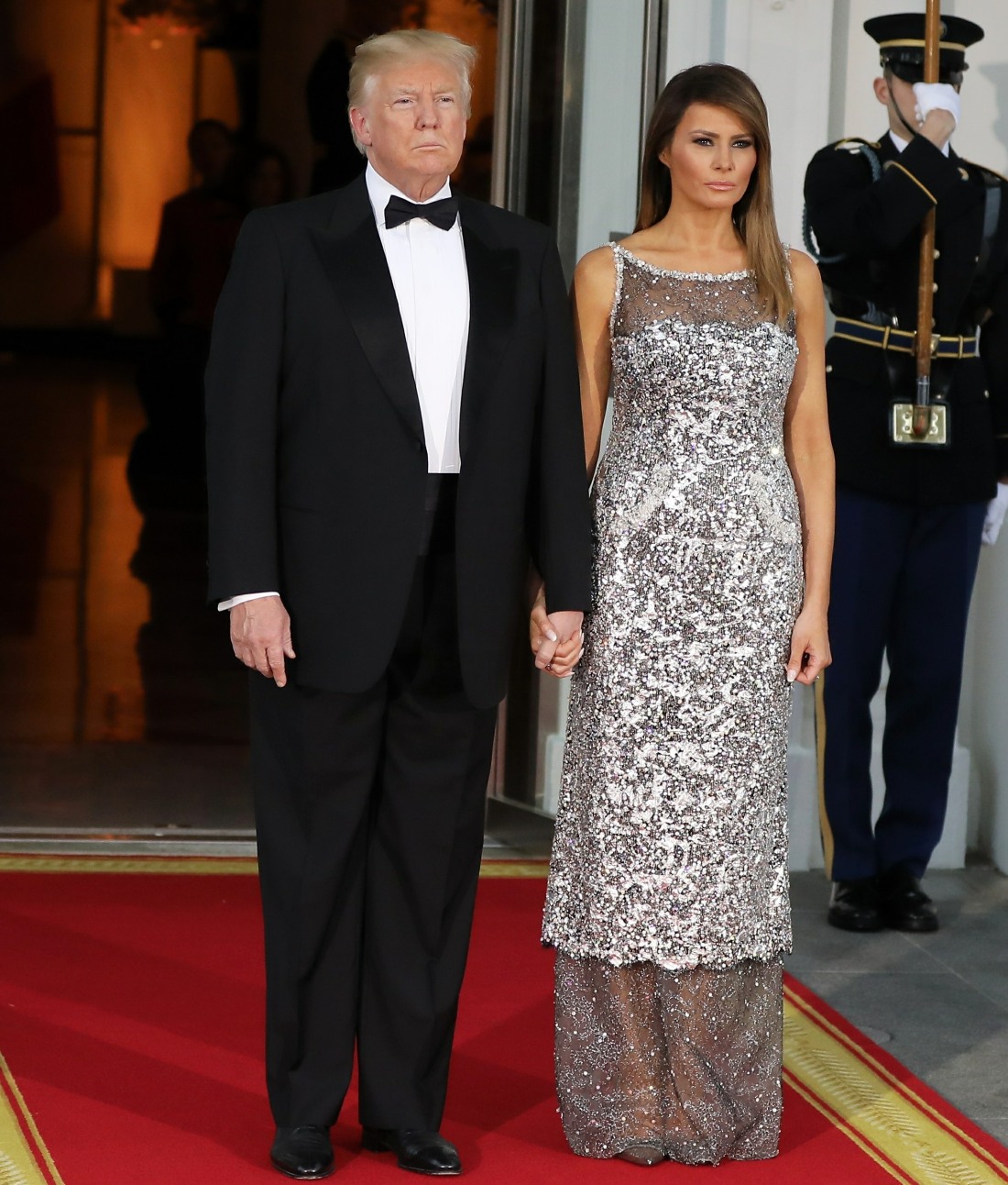 Donald Trump, Melania Trump, Emmanuel Macron, and Brigitte Macron attend a dinner at the White House