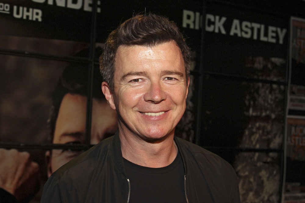 Rick Astley signs copies of his new album '50' .