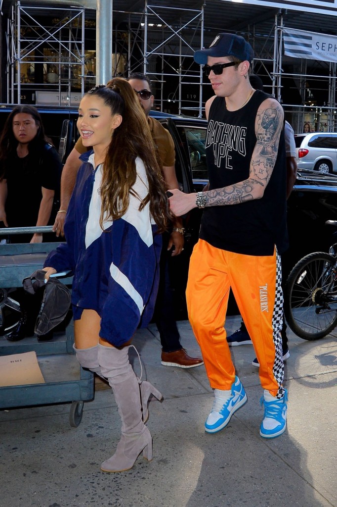 Ariana Grande and Pete Davidson smile for the camera