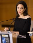 Angelina Jolie speaks to the press after a NATO meeting in Brussels