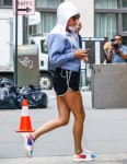 Taylor Swift hurries home after a morning workout
