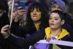 Asia Argento and Rose McGowan participate in a parade on International Women's Day in Rome