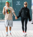 Justin Bieber takes Hailey Baldwin for a stroll ahead of another date night at the movie's