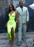 Kim Kardashian gets a helping hand from her man Kanye West while they grab ice cream