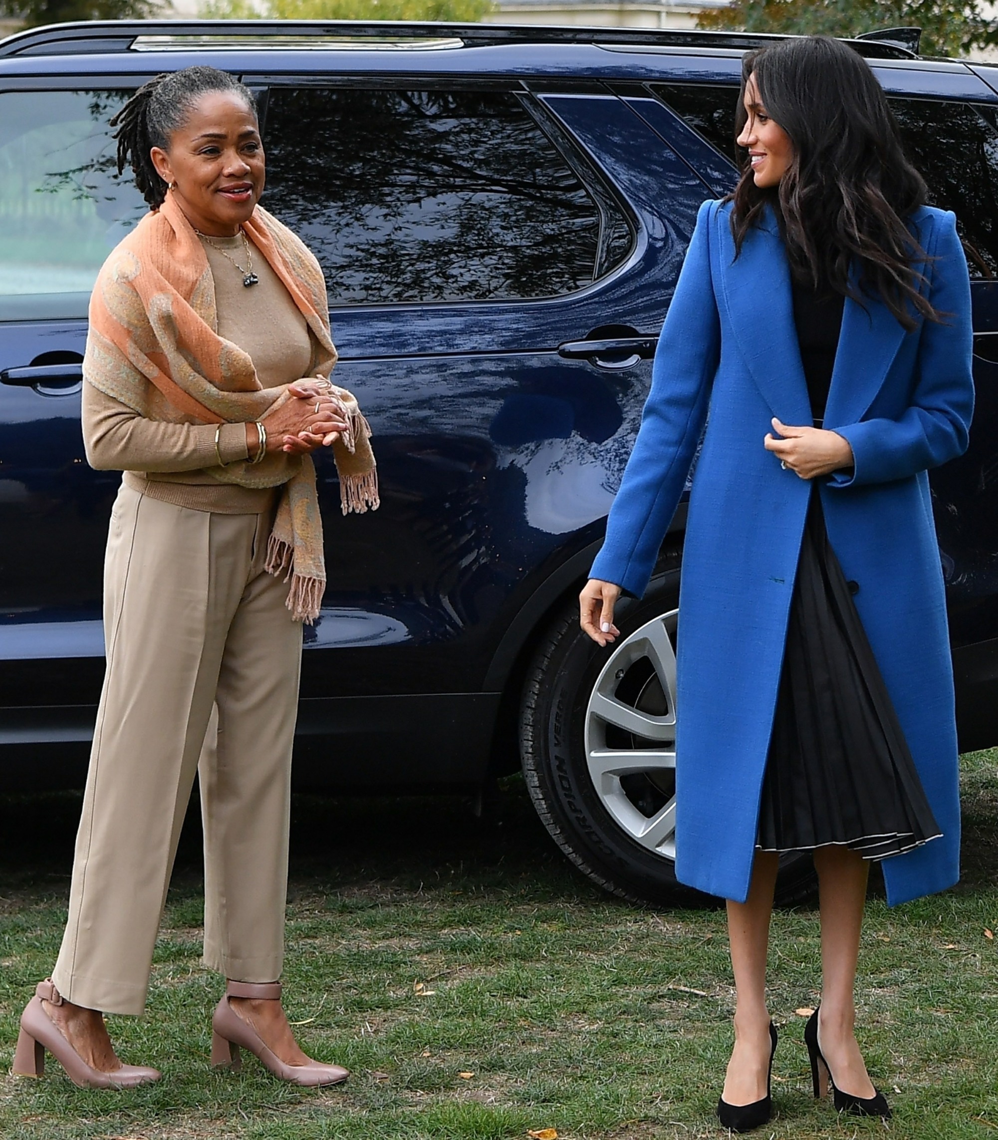 Meghan Markle takes her Mum to Grenfell Cookbook launch with Prince Harry