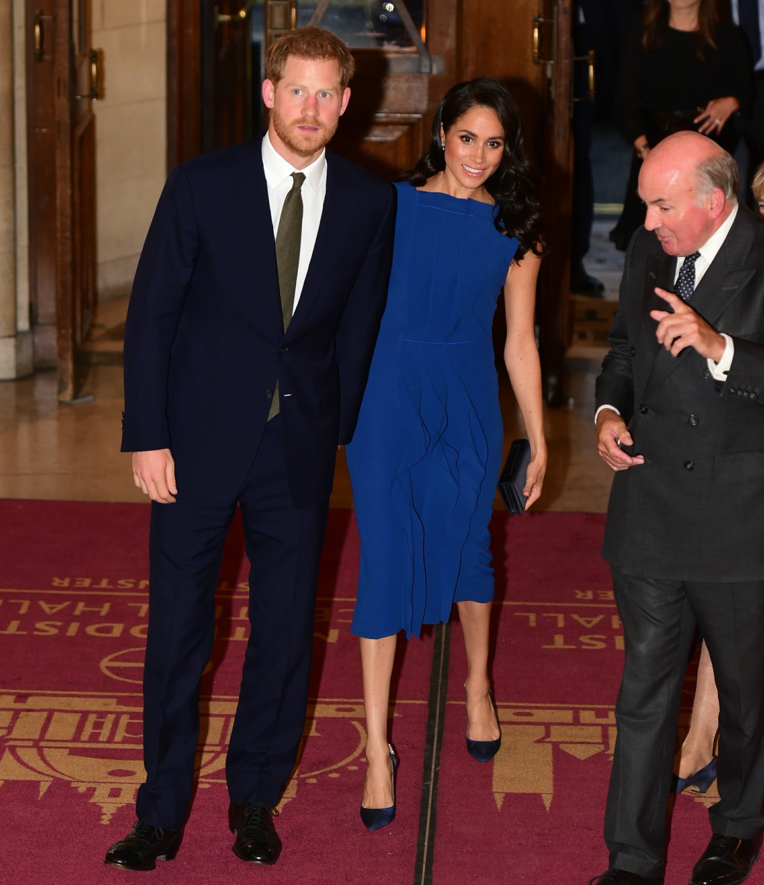 The Duke and Duchess of Sussex meet guests during the interval of a commemorativ