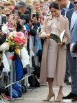 The Duke of Sussex and Duchess of Sussex greet crowds of well wishers at Viaduct Harbour