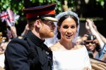 Newlyweds Prince Harry & Megan Markle travel down Windsor street after the Royal Wedding