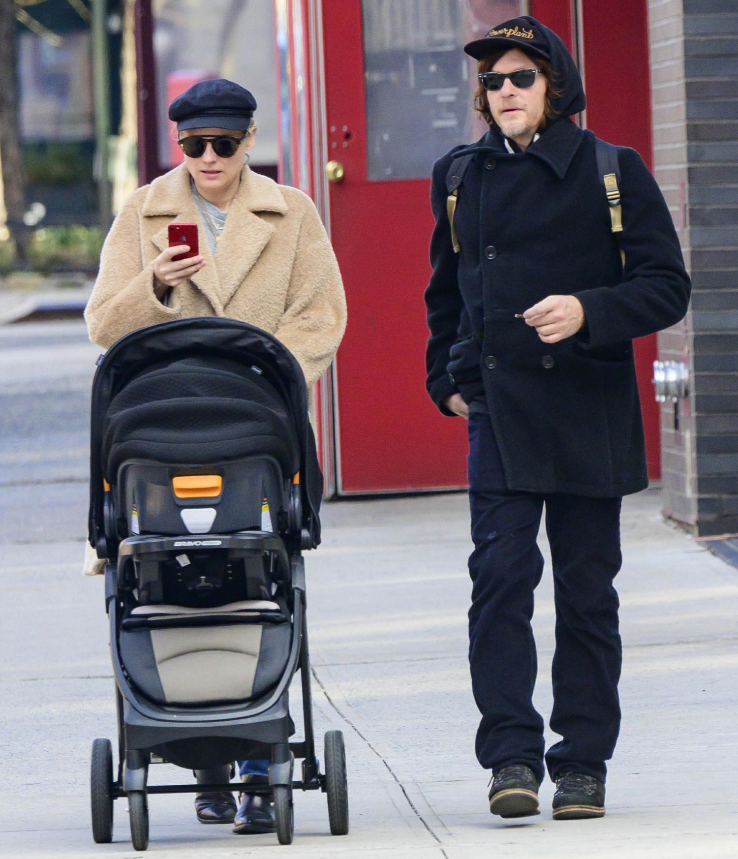 First photos!  Diane Kruger and Norman Reedus  are spotted for the first time out with their baby