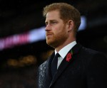 Britain's Prince Harry stands during a wreath-laying ceremony to commemorate 100 years since the end of the First World War, before the England v New Zealand rugby match at Twickenham Stadium, in London