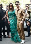 Priyanka Chopra and Nick Jonas are all smiles posing for pictures as newlyweds in Jodhpur, India